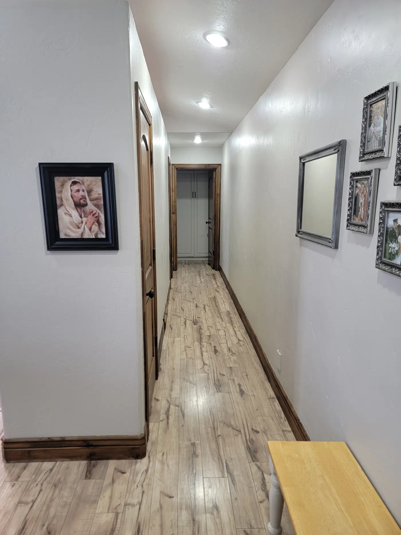 After — the hall, same flooring