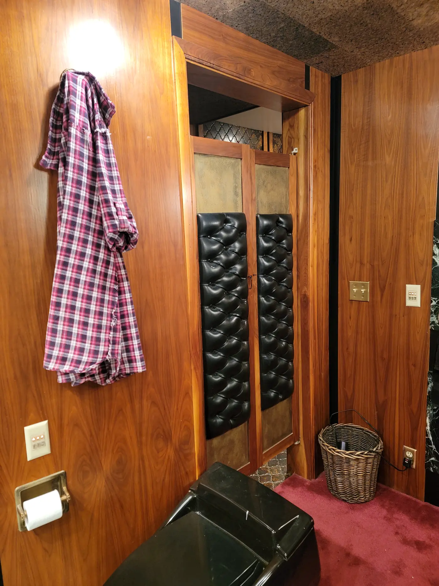 Before — paneling and red carpet