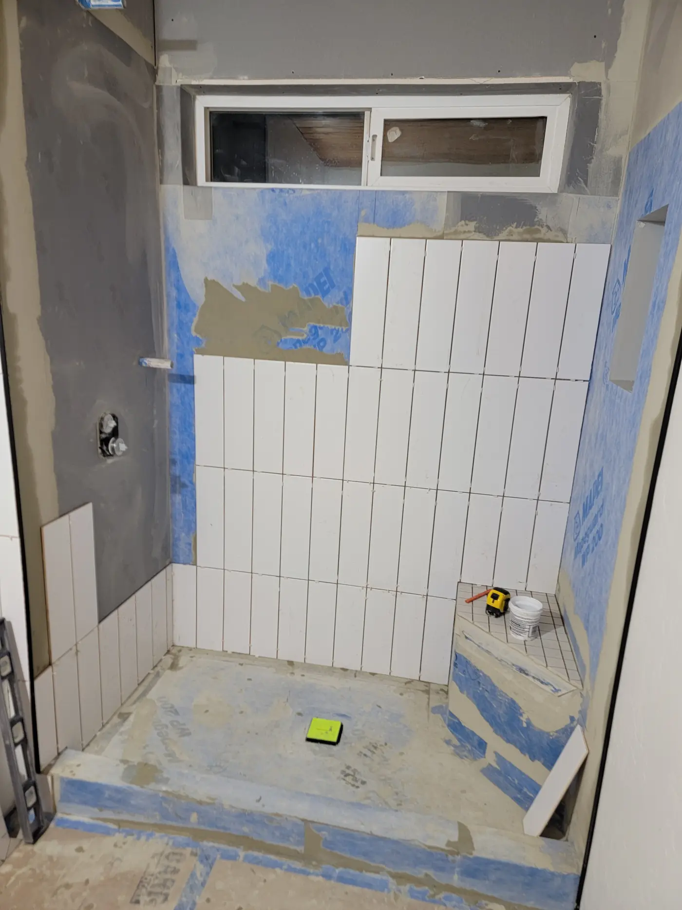 Tile going up over the membrane